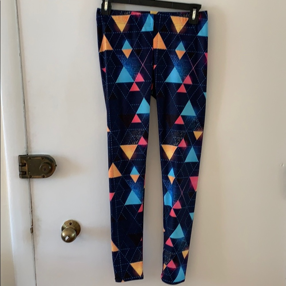 Multi colored gear bunch medium leggings NEW
